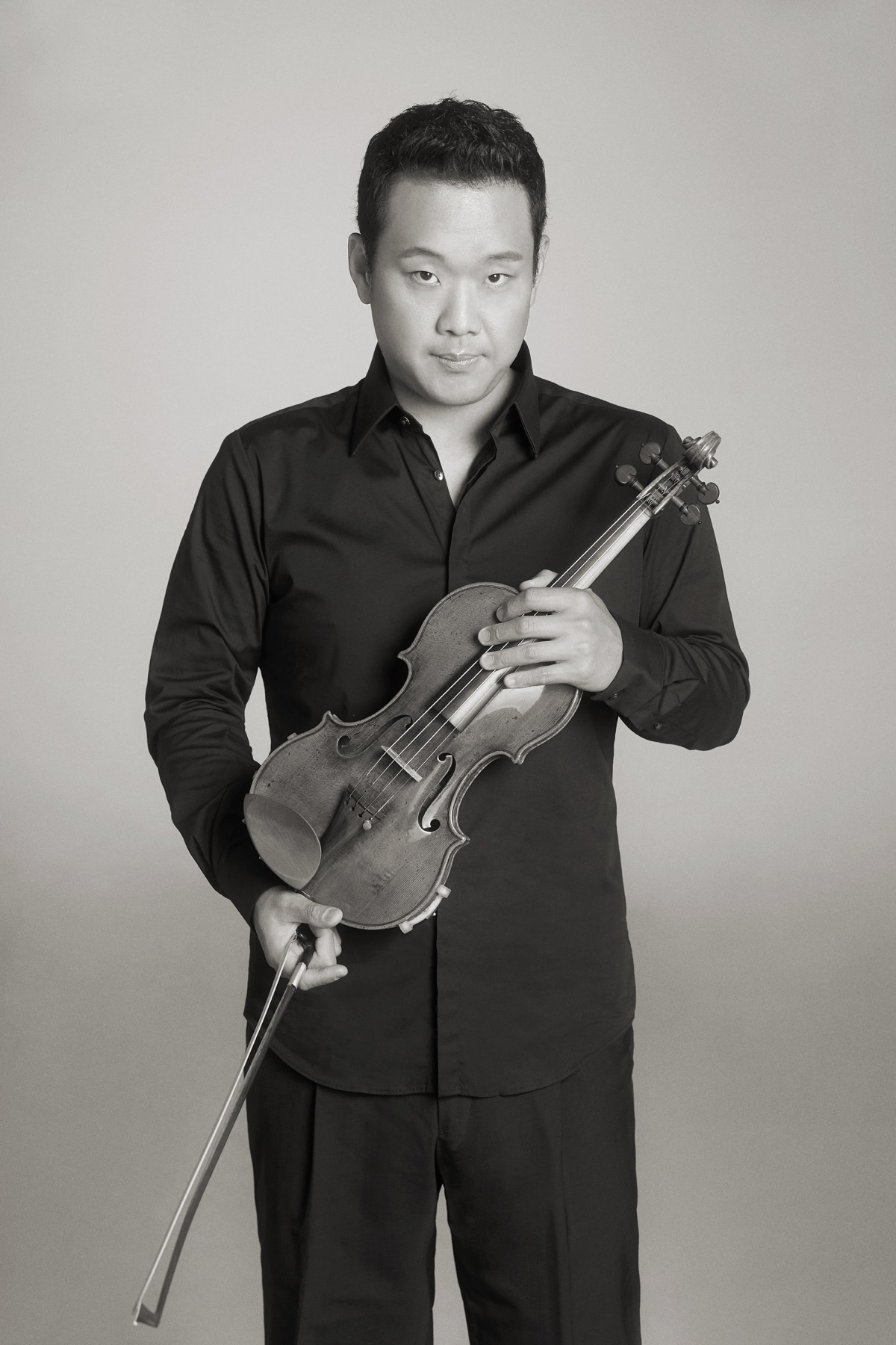 Dennis Kim, black and white studio portrait