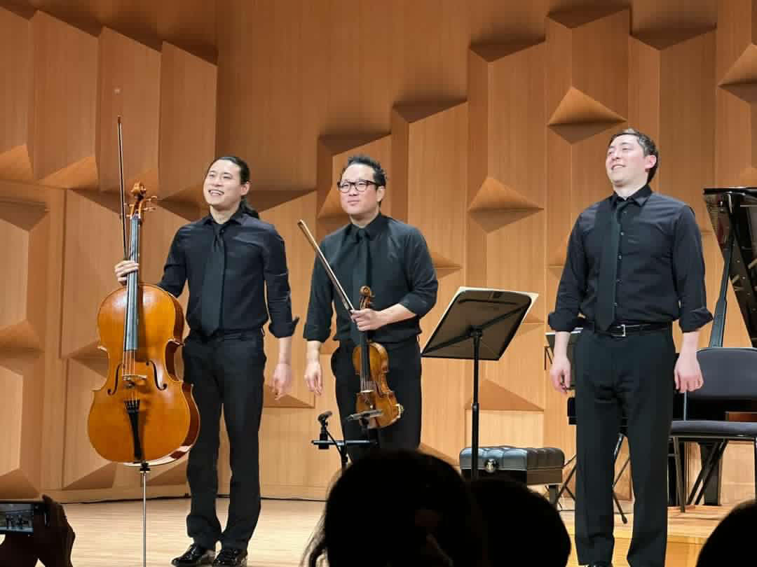 Dennis Kim, centre, taking a bow with Trio Barclay